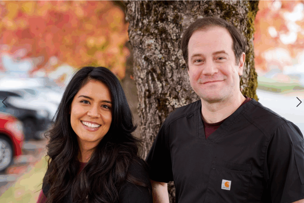 Dr. Erik Gudmundson & Dr. Natalie Rubio, our Renton doctors, standing outside the clinic in SE Seattle.