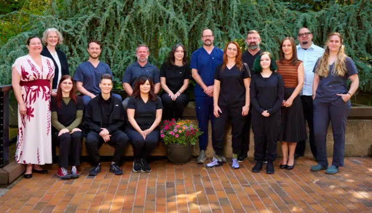 Full Potential HRT Clinic Tigard team group photo outside the clinic.